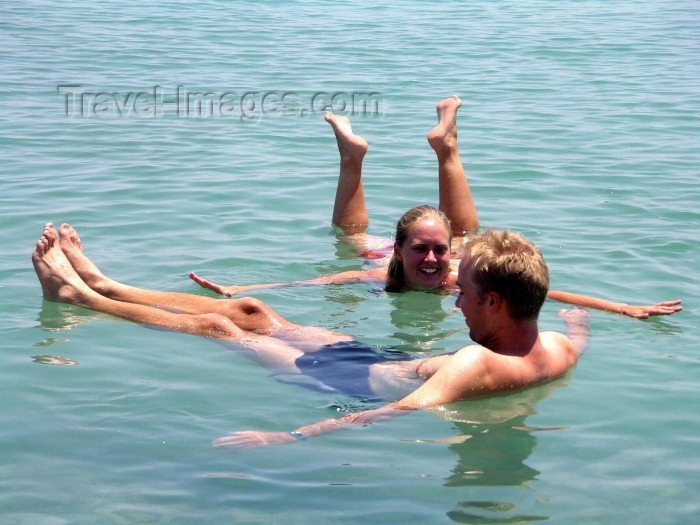 israel71: Israel - Dead sea: couple floating - buoyancy caused by high salinity - photo by R.Wallace - (c) Travel-Images.com - Stock Photography agency - Image Bank