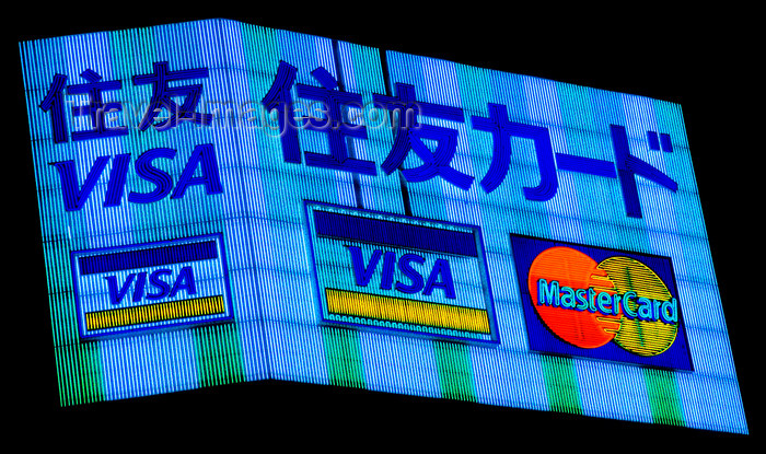 japan73: Neon advertising sign - credit cards, Tokyo, Japan. photo by B.Henry - (c) Travel-Images.com - Stock Photography agency - Image Bank
