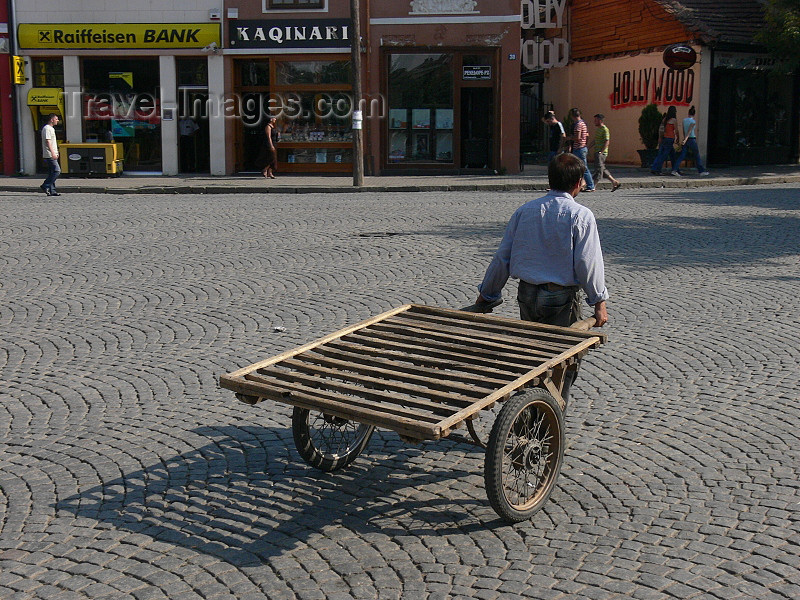 kosovo5: Kosovo - Prizren / Prizreni: street scene - man with a barrow / push cart / trolley - photo by J.Kaman - (c) Travel-Images.com - Stock Photography agency - Image Bank