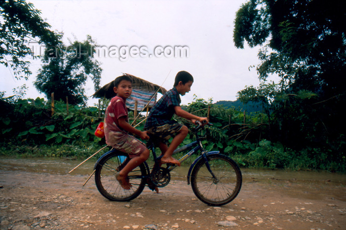 laos66: Laos - Vang Vieng - Children going to fish - tow on a bike - photo by  - photo by K.Strobel - (c) Travel-Images.com - Stock Photography agency - Image Bank