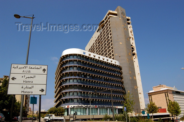 lebanon38: Lebanon / Liban - Beirut: old and new - Lebanese Canadian Bank. American University sign and the old Holiday Inn - photo by J.Wreford - (c) Travel-Images.com - Stock Photography agency - Image Bank