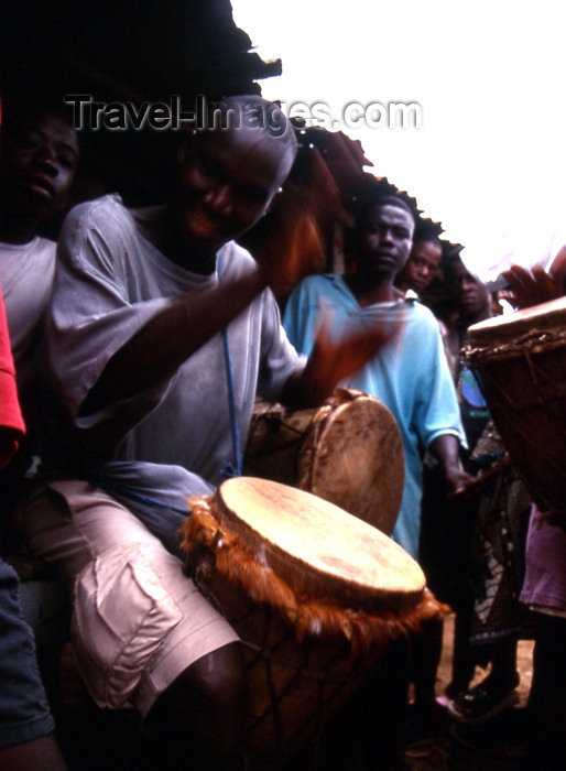 liberia26: Grand Bassa County, Liberia, West Africa: Buchanan - drummer - African musician - photo by M.Sturges - (c) Travel-Images.com - Stock Photography agency - Image Bank