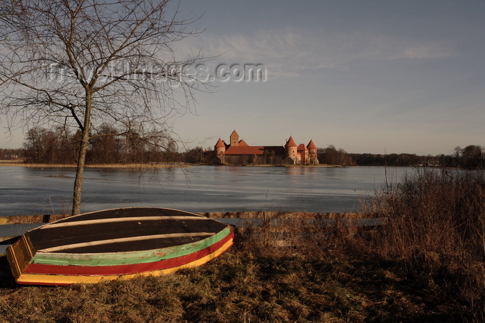 lithuania214: Trakai, Lithuania: Trakai Island Castle and boat resting on the shore of lake Galve - photo by A.Dnieprowsky - (c) Travel-Images.com - Stock Photography agency - Image Bank