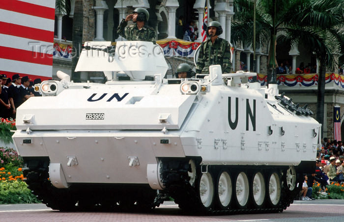 mal476: National day military parade - APC - MIFV K200 South Korean infantry fighting vehicle in UN colours, Kuala Lumpur, Malaysia - photo by B.Lendrum - (c) Travel-Images.com - Stock Photography agency - Image Bank