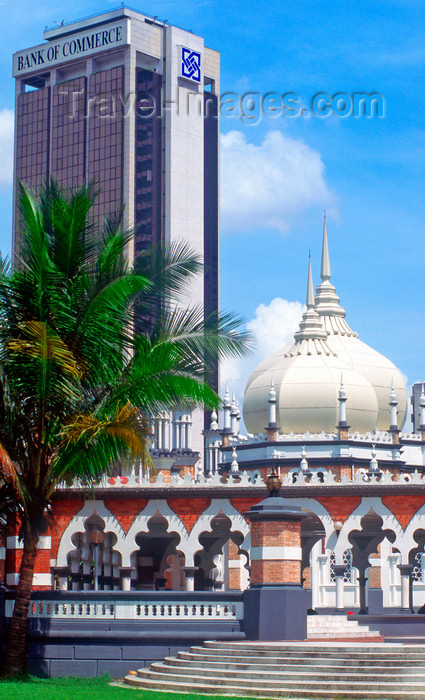 mal481: Masjid Jamek mosque and the Bank of Commerce building - city center, Kuala Lumpur, Malaysia - photo by B.Lendrum - (c) Travel-Images.com - Stock Photography agency - Image Bank
