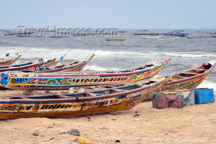 mauritania33: Nouakchott, Mauritania: traditional wooden fishing boats aligned along the beach - fishing harbor, the Port de Pêche - photo by M.Torres - (c) Travel-Images.com - Stock Photography agency - Image Bank
