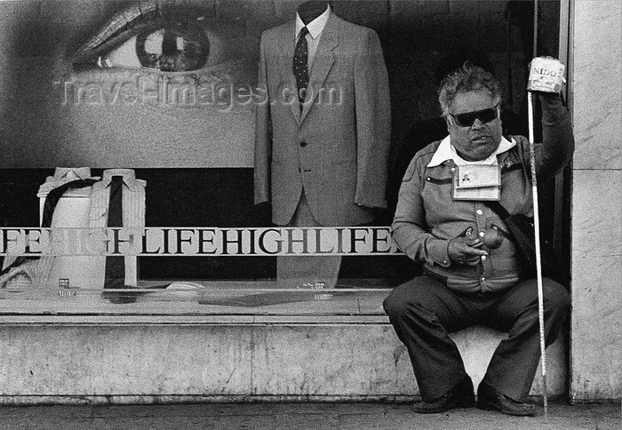mexico352: Mexico City: High Life and blind  beggar - the black and white of Mexican life - photo by Y.Baby - (c) Travel-Images.com - Stock Photography agency - Image Bank