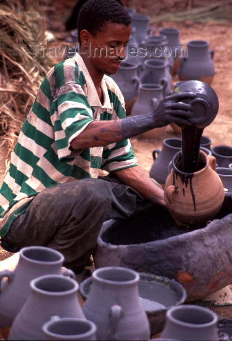 moroc134: Morocco / Maroc - Tamegroute: potter  at work - Moroccan artisan - photo by F.Rigaud - (c) Travel-Images.com - Stock Photography agency - Image Bank