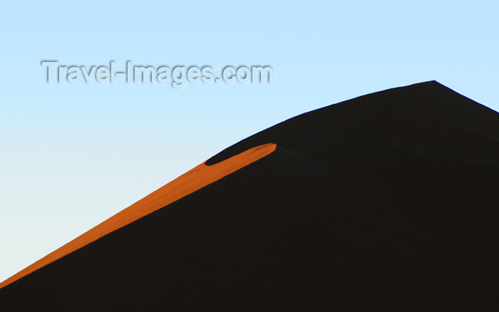 namibia167: Namibia Orange crescentslice silhouetted sand dune at sunrise, Sossusvlei - photo by B.Cain - (c) Travel-Images.com - Stock Photography agency - Image Bank