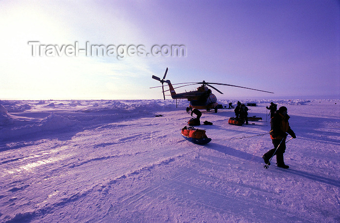 north-pole5: Arctic Ocean: Russian MI-8 helicopter and skiers - North Pole expedition (photo by Eric Philips) - (c) Travel-Images.com - Stock Photography agency - Image Bank