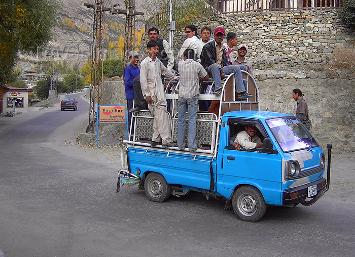 pakistan165: Karimabad / Baltit - Northern Areas, Pakistan: riding is better than walking - crowded Chinese made pick-up truck - Hunza Valley - KKH - photo by D.Steppuhn - (c) Travel-Images.com - Stock Photography agency - Image Bank
