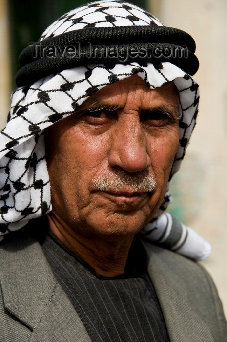 palest21: Hebron, West Bank, Palestine: portrait of local man wearing a keffiyeh scarf - photo by J.Pemberton - (c) Travel-Images.com - Stock Photography agency - Image Bank
