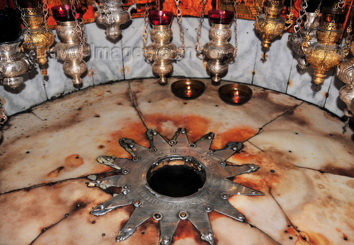 palest66: Bethlehem, West Bank, Palestine: Church of the Nativity - Grotto of the Nativity - Silver star marking the place where Jesus was born according to Christian tradition - Latin inscription read 'Here of the Virgin Mary Christ was born' - photo by M.Torres - (c) Travel-Images.com - Stock Photography agency - Image Bank
