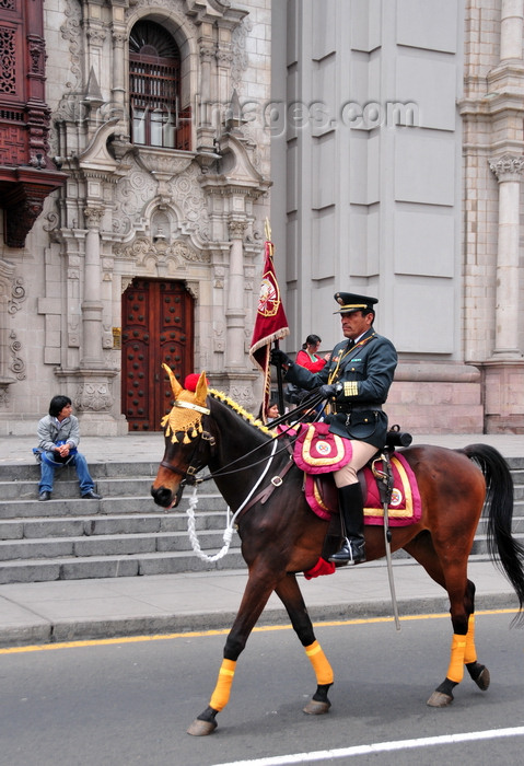peru82: Lima, Peru: mounted officer leads the change of the guard cortège - Plaza de Armas, in front of the Archbishop's palace - photo by M.Torres - (c) Travel-Images.com - Stock Photography agency - Image Bank