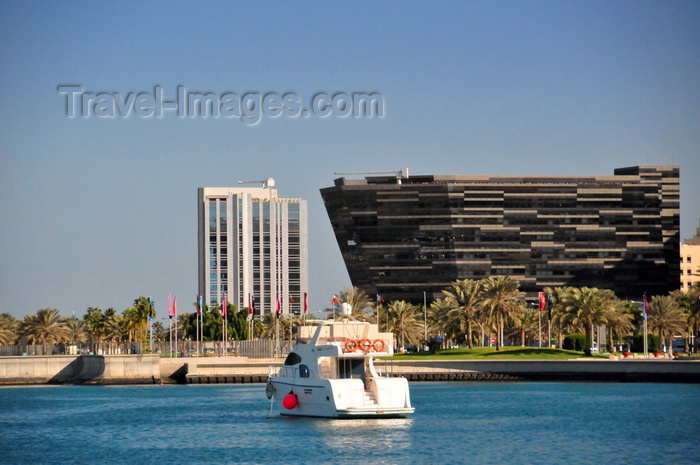 qatar57: Doha, Qatar: Al Hitmi Towers (right) designed by Norr-Group Architects and Sultan Bin Abdullah Al-Asiri tower, housing the Qatar Port Management Company - yacht in front of the Corniche - photo by M.Torres - (c) Travel-Images.com - Stock Photography agency - Image Bank