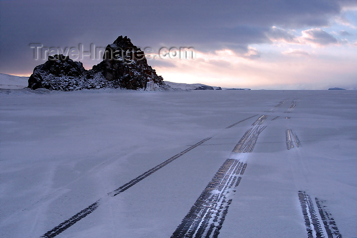 russia24: Lake Baikal, Irkutsk oblast, Siberian Federal District, Russia: tire tracks along Olkhon island - ice and snow - photo by B.Cain - (c) Travel-Images.com - Stock Photography agency - Image Bank