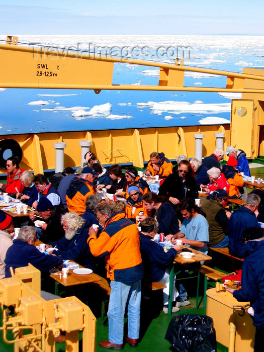 russia425: Russia - Bering Strait (Chukotka AOk): Kapitan Khlebnikov - BBQ on the foredeck - party on an icebreaker (photo by R.Eime) - (c) Travel-Images.com - Stock Photography agency - Image Bank