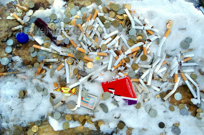 russia761: Lake Baikal, Irkutsk oblast, Siberian Federal District, Russia: Shaman oifferings - money and cigarettes on the snow - photo by B.Cain - (c) Travel-Images.com - Stock Photography agency - Image Bank