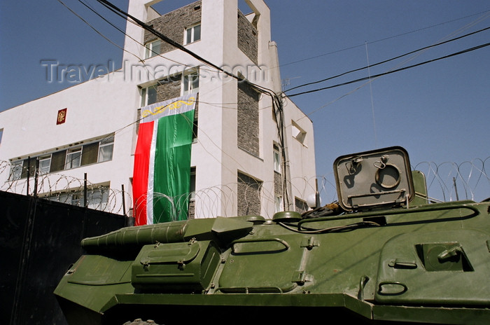 russia795: Chechnya, Russia - building, APC, barbed wire, flag of Chechnya and Russian coat of arms - photo by A.Bley - (c) Travel-Images.com - Stock Photography agency - Image Bank