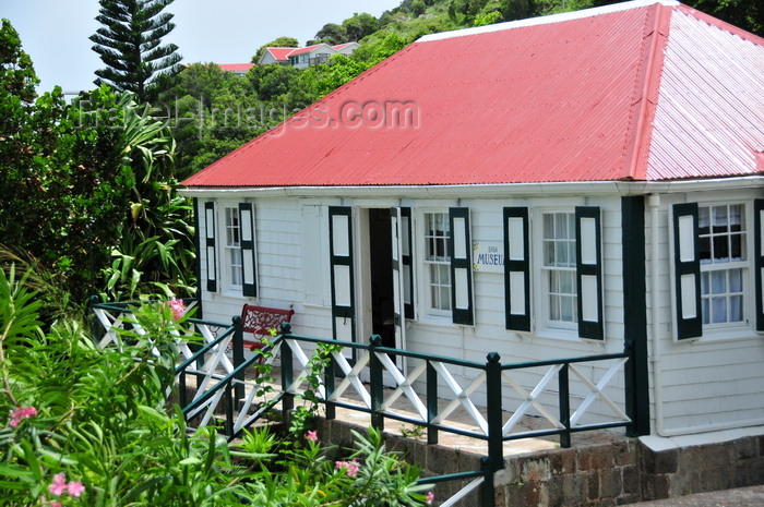 saba29: Windwardside, Saba: the museum - a typical Saban home, whitewashed with green-shuttered windows - displays the dwelling of a XIX century Dutch sea captain - photo by M.Torres - (c) Travel-Images.com - Stock Photography agency - Image Bank