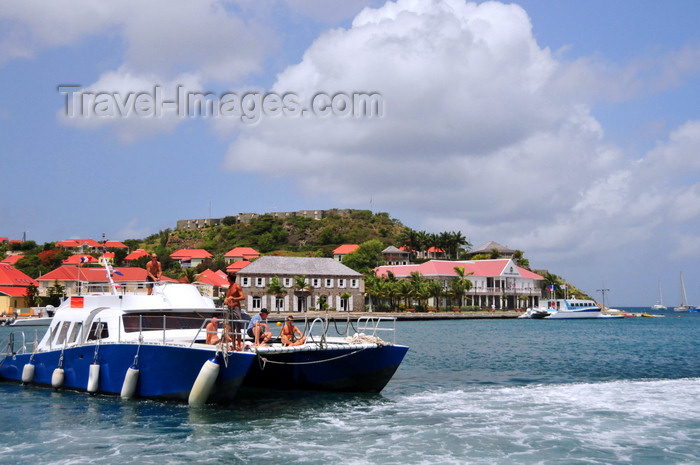 saint-barthelemy35: Gustavia, St. Barts / Saint-Barthélemy: a divers' boat returns to the harbour - museum and local government buildings in the background - tip of Gustavia Peninsula - photo by M.Torres - (c) Travel-Images.com - Stock Photography agency - Image Bank