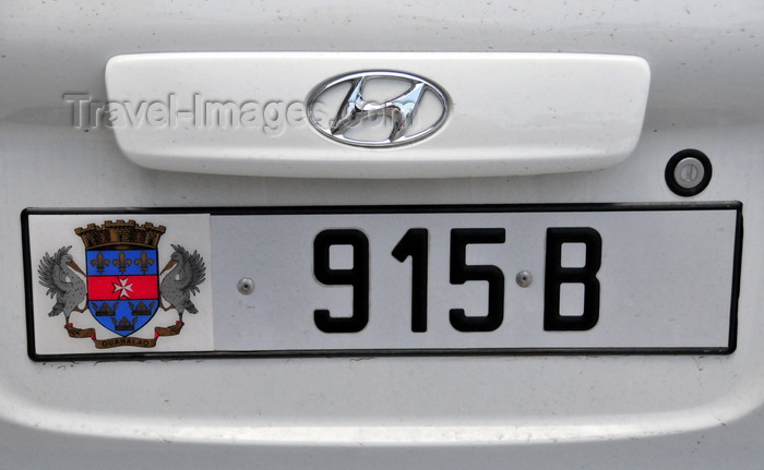 saint-barthelemy36: Gustavia, St. Barts / Saint-Barthélemy: car license plate - St Barts coat of arms - Maltese cross, the Fleur-de-lis, crown, pelicans, and the island's Amerindian name Ouanalao - Hyundai - photo by M.Torres - (c) Travel-Images.com - Stock Photography agency - Image Bank