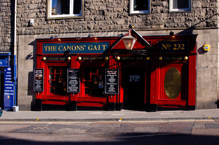 scot127: Scotland - Edinburgh: this clever sign is a takeoff on the nearby street Canongate - vibrant colors in the storefront - 'The Canon's Gait' - photo by C.McEachern - (c) Travel-Images.com - Stock Photography agency - Image Bank