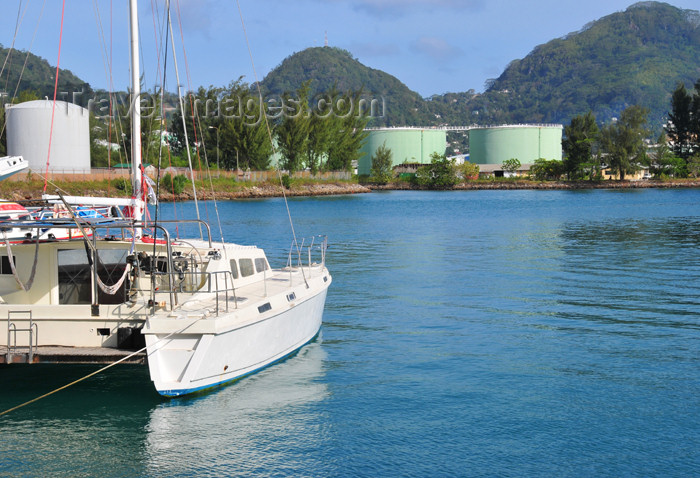 seychelles90: Mahe, Seychelles: Victoria - in the port - catamaran and fuel storage - photo by M.Torres - (c) Travel-Images.com - Stock Photography agency - Image Bank