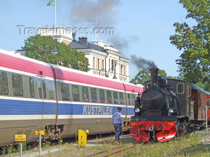 sweden104: Vastervik, Kalmar län, Sweden: Steam and Diesel Trains by he station - old and new - photo by A.Bartel - (c) Travel-Images.com - Stock Photography agency - Image Bank
