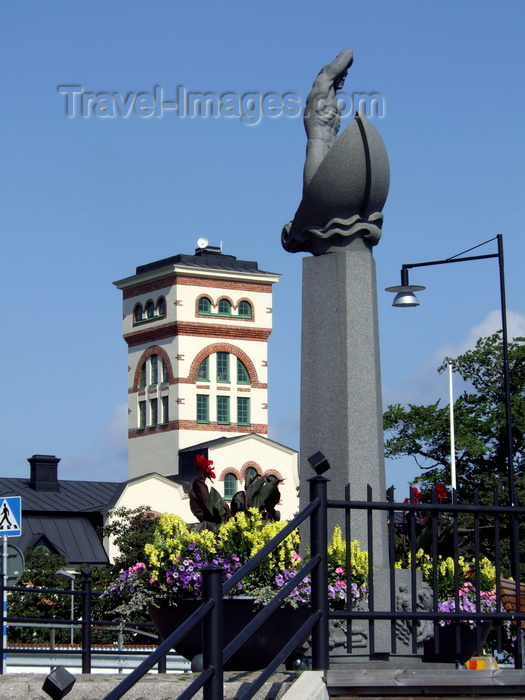 sweden97: Vastervik, Kalmar län, Sweden: Tourist Office and statue on boat - photo by A.Bartel - (c) Travel-Images.com - Stock Photography agency - Image Bank