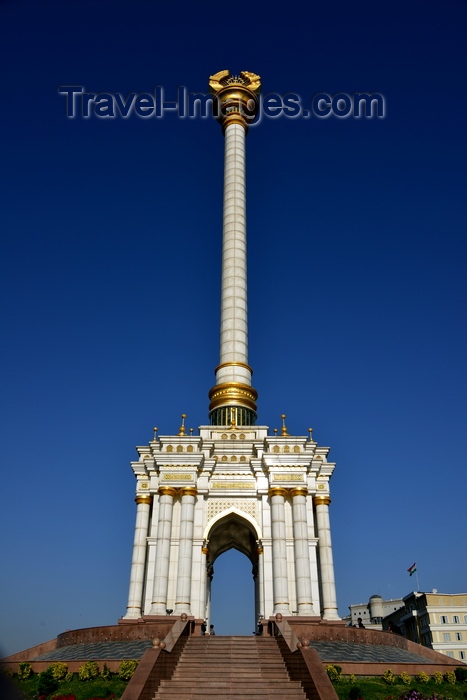 tajikistan7: Dushanbe, Tajikistan: the Parchan column, bearing the Tajikistani national emblem / coat of arms - seen against blue sky - photo by M.Torres - (c) Travel-Images.com - Stock Photography agency - Image Bank