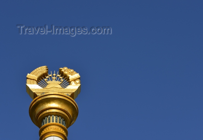 tajikistan9: Dushanbe, Tajikistan: column bearing the Tajikistani national emblem / coat of arms - Soviet style frame with crown, sun and the Pamir mountains - photo by M.Torres - (c) Travel-Images.com - Stock Photography agency - Image Bank