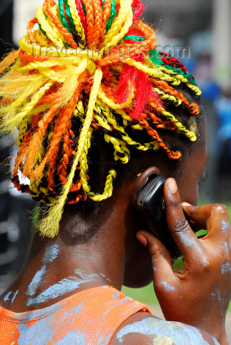 trinidad-tobago137: Port of Spain, Trinidad and Tobago: woman with colourful ropes on the hair - on the phone - carnival - photo by E.Petitalot - (c) Travel-Images.com - Stock Photography agency - Image Bank