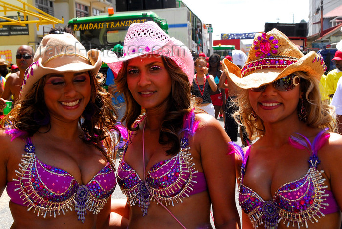 trinidad-tobago140: Port of Spain, Trinidad and Tobago: trio of Trinidad girls wearing colourful hats during carnival - photo by E.Petitalot - (c) Travel-Images.com - Stock Photography agency - Image Bank