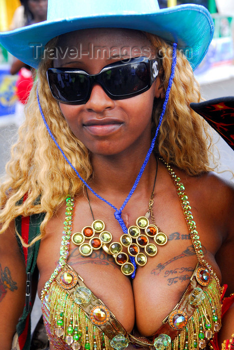 trinidad-tobago147: Port of Spain, Trinidad and Tobago: girl with tattoos on the breasts and wearing a blue hat - carnival - photo by E.Petitalot - (c) Travel-Images.com - Stock Photography agency - Image Bank