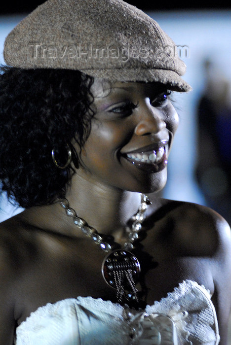 trinidad-tobago165: Port of Spain, Trinidad and Tobago: smiling black woman wearing a cap during carnival - photo by E.Petitalot - (c) Travel-Images.com - Stock Photography agency - Image Bank