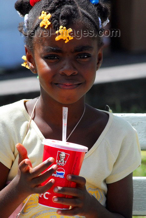 trinidad-tobago49: Port of Spain, Trinidad: a girl drinks a soda - photo by E.Petitalot - (c) Travel-Images.com - Stock Photography agency - Image Bank