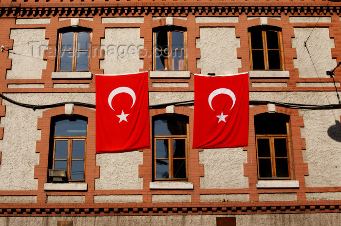 turkey175: Istanbul, Turkey: turkish flags - Istiklal caddesi, the Independence Avenue - Beyoglu district - photo by J.Wreford - (c) Travel-Images.com - Stock Photography agency - Image Bank