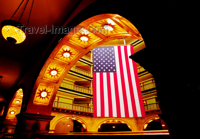 usa102: Denver, Colorado, USA: a large American flag hangs inside the Brown Palace Hotel - photo by C.Lovell - (c) Travel-Images.com - Stock Photography agency - Image Bank