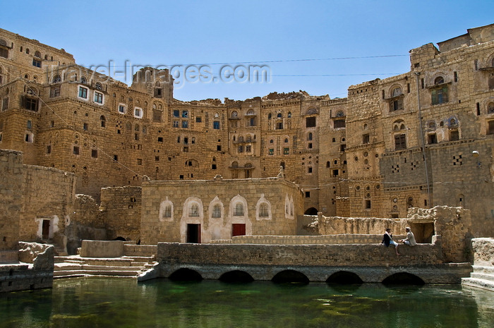 yemen103: Hababah, Sana'a governorate, Yemen: the town's old cistern is still used - pool and neighbouring stone houses - photo by J.Pemberton - (c) Travel-Images.com - Stock Photography agency - Image Bank