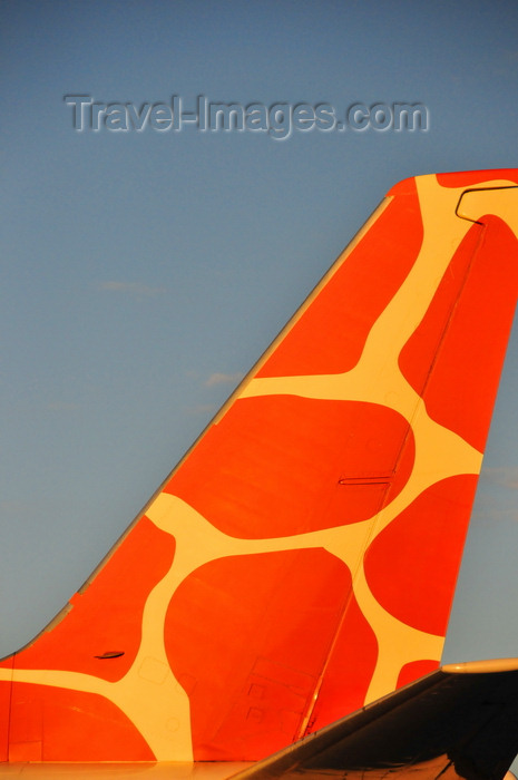 zambia10: Lusaka, Zambia: giraffe themed tail of Zambezi Airlines Boeing 737-5Y0, 9J-ZJB cn 26100 - Lusaka / Kenneth Kaunda International Airport - LUN - photo by M.Torres - (c) Travel-Images.com - Stock Photography agency - Image Bank