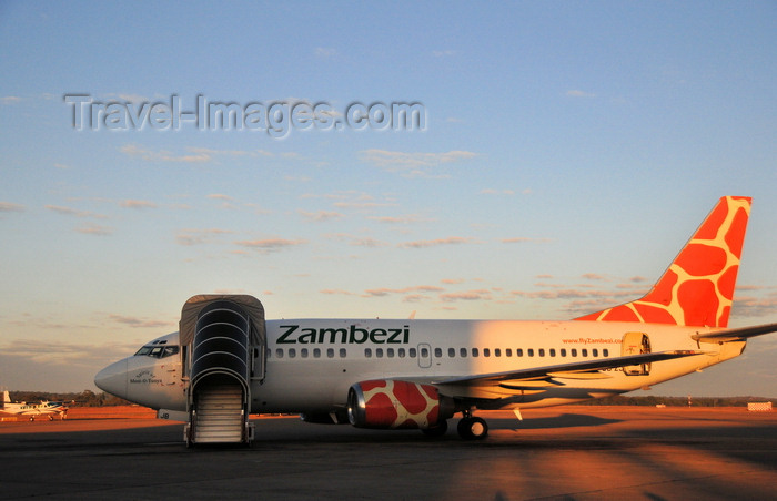 zambia8: Lusaka, Zambia: Zambezi Airlines Boeing 737-5Y0, 9J-ZJB cn 26100 - Lusaka / Kenneth Kaunda International Airport - LUN - photo by M.Torres - (c) Travel-Images.com - Stock Photography agency - Image Bank