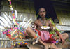 PNG - Papua New Guinea - Man sitting on porch next to his headdress, MurickLakes (photo by B.Cain)