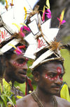 PNG - Papua New Guinea - Two performers with headdresses, Tuam Island - photo by B.Cain