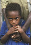 PNG - Papua New Guinea - Young boy hugged by father, Murick Lakes (photo by B.Cain)