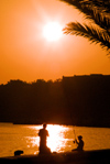 Setbal: anglers, Sao Filipe fort and the sun / pescadores, o forte de So Filipe e o sol - photo by M.Durruti