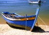Portugal - Algarve - Alvor: old rowing boat in the harbour (photo by D.S.Jackson)