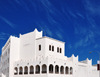 Doha, Qatar: white building containing the Amphitheater of Souq Waqif, Ali Bin Abdullah St and Banks St - photo by M.Torres