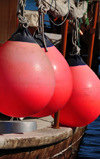 Doha, Qatar: large red buoys on a dhow's portside - Dhow harbour - photo by M.Torres