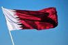Doha, Qatar: flag of Qatar - maroon field with a broad white serrated band - Dhow harbour - photo by M.Torres